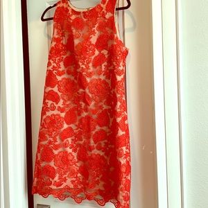 Stunning red-orange lace dress with gold lining